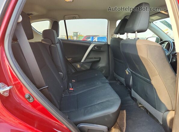 2T3BFREV7JW725950 2018 TOYOTA RAV4 Burgundy Rear interior view