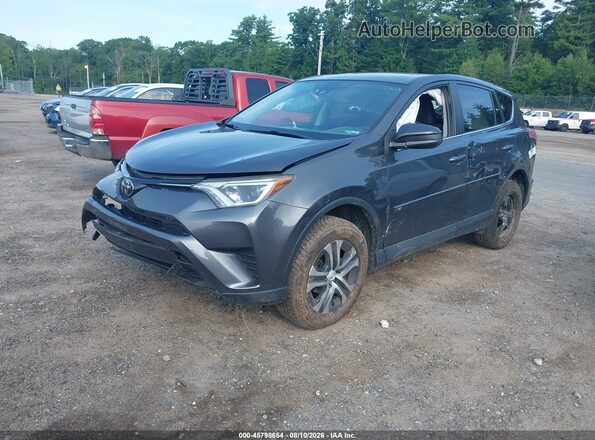 2T3BFREV7JW855243 2018 TOYOTA RAV4 Gray Front left