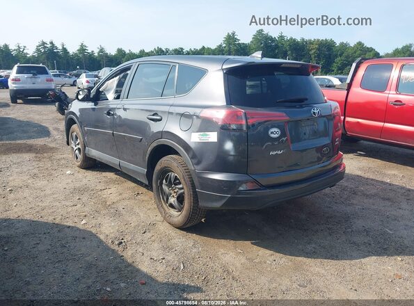 2T3BFREV7JW855243 2018 TOYOTA RAV4 Gray Rear left