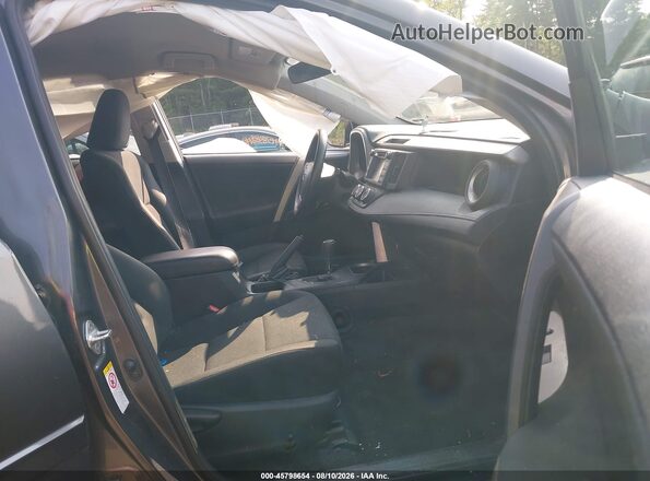 2T3BFREV7JW855243 2018 TOYOTA RAV4 Gray Front interior view