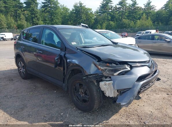 2T3BFREV7JW855243 2018 TOYOTA RAV4 Gray Front view
