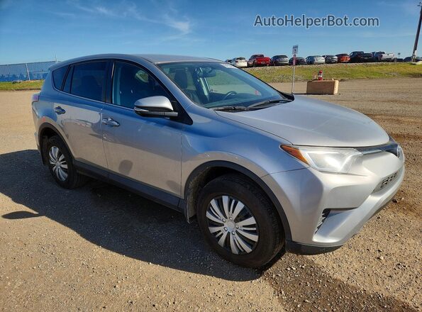 2T3BFREV8GW489897 2016 TOYOTA RAV4 Silver Вид салону спереду