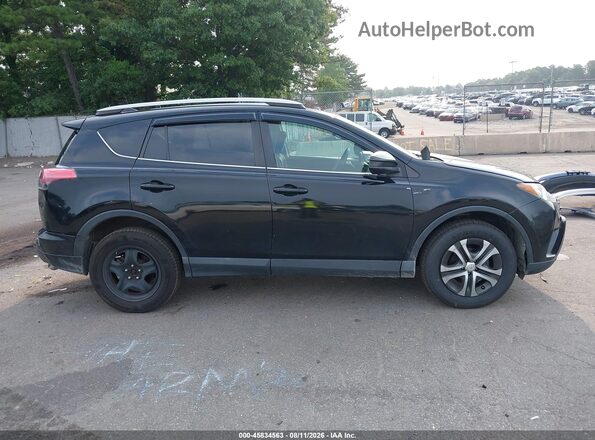 2T3BFREV8JW802681 2018 TOYOTA RAV4 Black Vista interior trasera