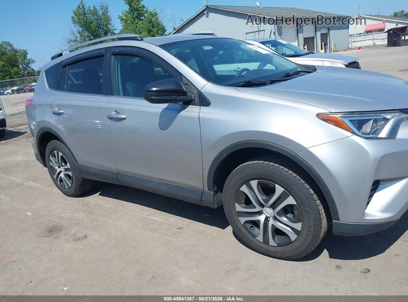 2T3BFREV9HW659475 2017 TOYOTA RAV4 Silver უკანა სალონის ხედი