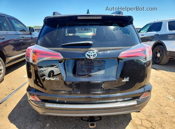 2T3BFREV9JW763471 2018 TOYOTA RAV4 Black Հետևի տեսք