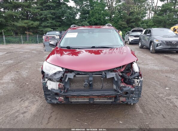 2T3BFREV9JW790671 2018 TOYOTA RAV4 Red უკანა სალონის ხედი
