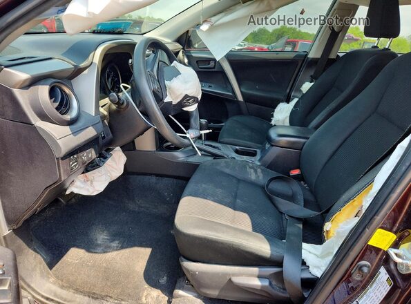 2T3BFREVXJW726543 2018 TOYOTA RAV4 Purple Front interior view