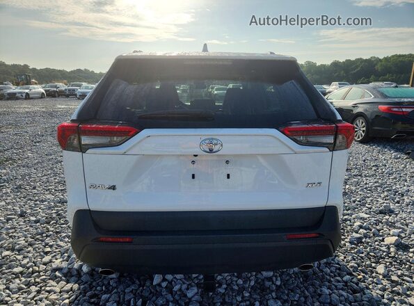 2T3C1RFV4KW050562 2019 TOYOTA RAV4 White Rear view