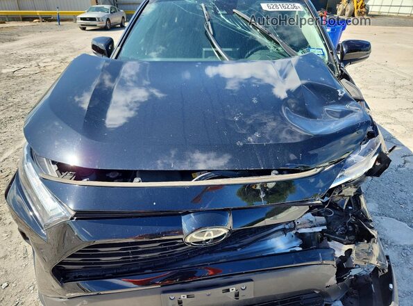 2T3C1RFV4NC197079 2022 TOYOTA RAV4 Black Rear interior view