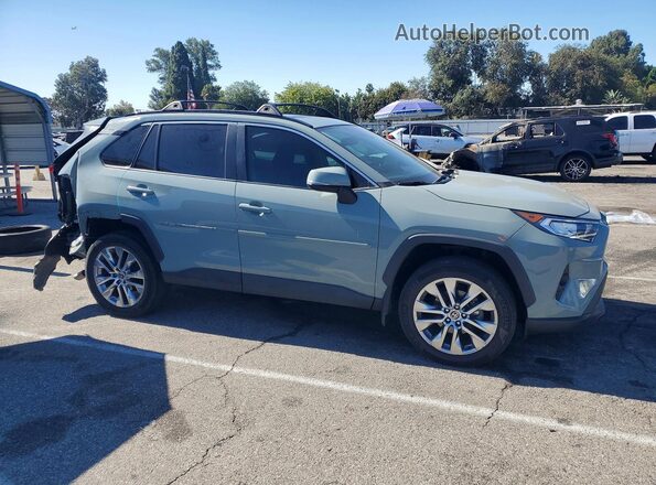 2T3C1RFV6MW145952 2021 TOYOTA RAV4 Серый Передняя правая четверть