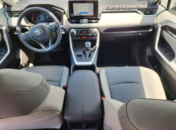 2T3C1RFV7RW350753 2024 TOYOTA RAV4 White Dashboard view