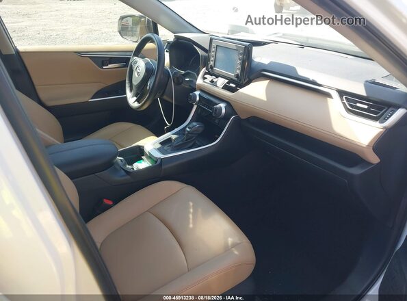 2T3C1RFVXKC031077 2019 TOYOTA RAV4 Белый Вид салона спереди