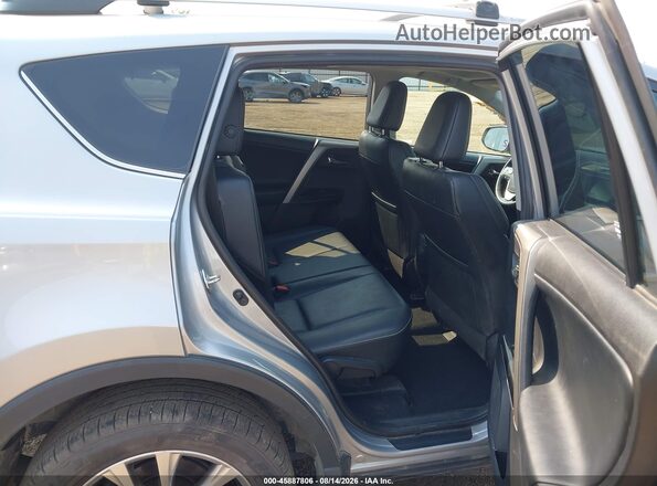 2T3DFREV0JW856162 2018 TOYOTA RAV4 Silver VIN sticker view