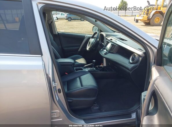 2T3DFREV0JW856162 2018 TOYOTA RAV4 Silver Front interior view