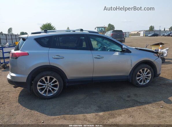 2T3DFREV0JW856162 2018 TOYOTA RAV4 Silver Rear interior view