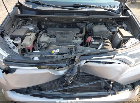 2T3DFREV0JW856162 2018 TOYOTA RAV4 Silver Rear view