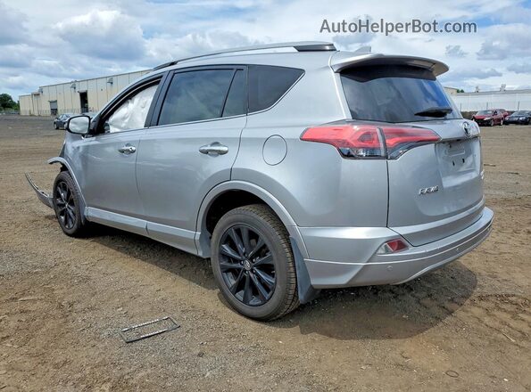2T3DFREV1HW580214 2017 TOYOTA RAV4 Silver Tył lewy