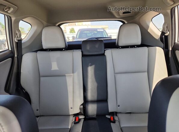 2T3DFREV2HW577242 2017 TOYOTA RAV4 White Rear seats view