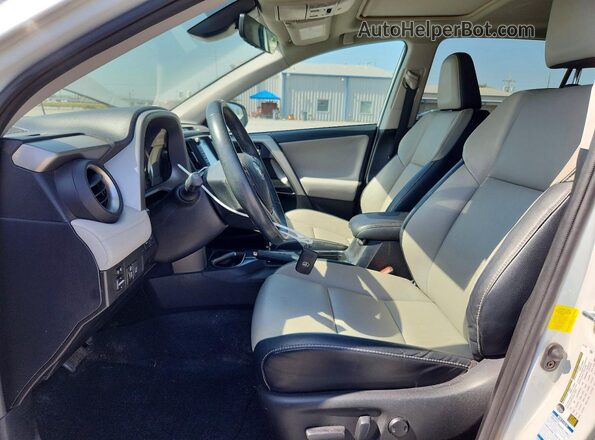 2T3DFREV2HW577242 2017 TOYOTA RAV4 White Front interior view