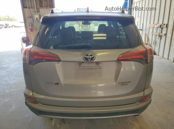 2T3DFREV3JW724450 2018 TOYOTA RAV4 Silver Rear view