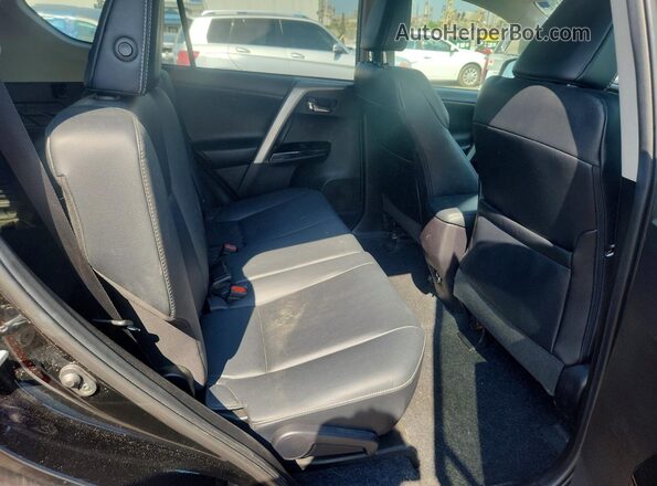 2T3DFREV6JW715905 2018 TOYOTA RAV4 Black Widok tylnych siedzeń