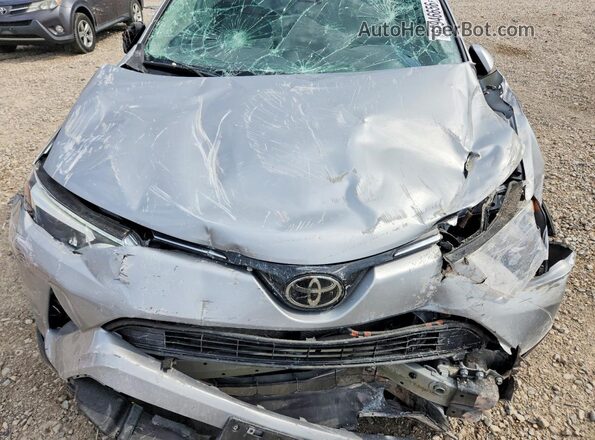 2T3DFREV6JW718853 2018 TOYOTA RAV4 Silver Սալոնի հետևի տեսք