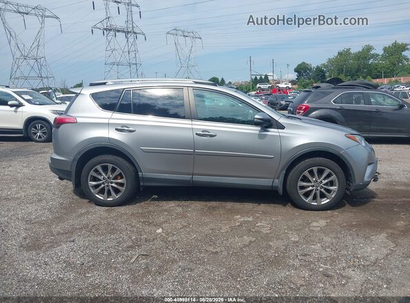 2T3DFREV9HW687642 2017 TOYOTA RAV4 Silver Вид задньої частини салону