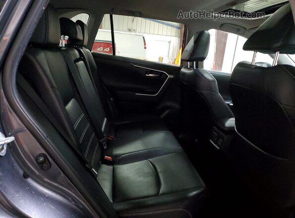 2T3DWRFV6KW003975 2019 TOYOTA RAV4 Charcoal Widok wnętrza z tyłu