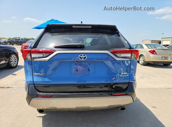 2T3E6RFV5PW038874 2023 TOYOTA RAV4 Blue Widok z tyłu
