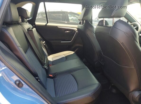 2T3E6RFV9RW059584 2024 TOYOTA RAV4 Синий Вид задней части салона