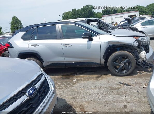 2T3E6RFVXMW007471 2021 TOYOTA RAV4 HYBRID Серебряный Вид задней части салона