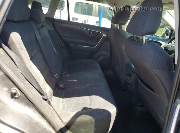 2T3F1RFV0KW063399 2019 TOYOTA RAV4 Gray Vista interior trasera