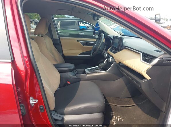 2T3H1RFV5KW038054 2019 TOYOTA RAV4 Красный Вид салона спереди