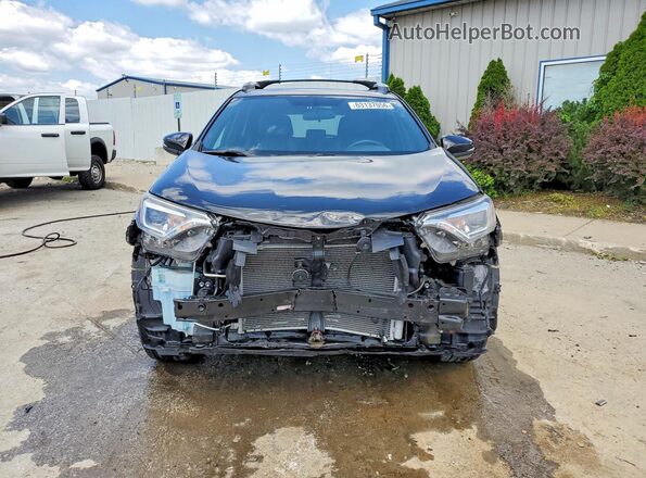 2T3JFREV1GW452489 2016 TOYOTA RAV4 Black Front view