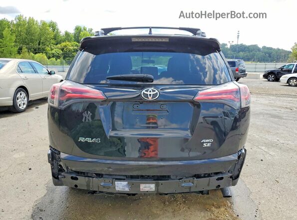 2T3JFREV1GW452489 2016 TOYOTA RAV4 Black Rear view