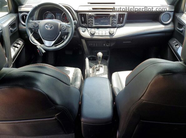 2T3JFREV1GW452489 2016 TOYOTA RAV4 Black Dashboard view