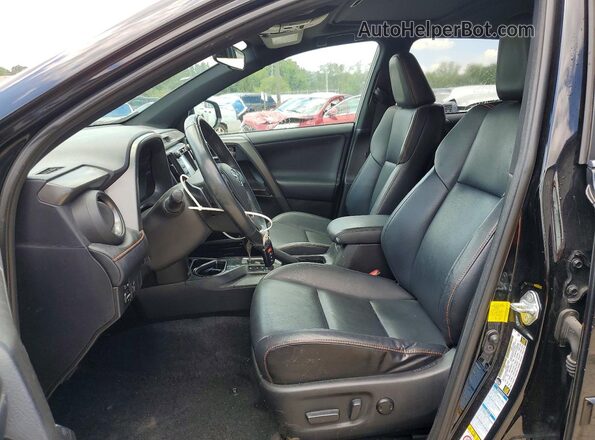 2T3JFREV1GW452489 2016 TOYOTA RAV4 Black Front interior view