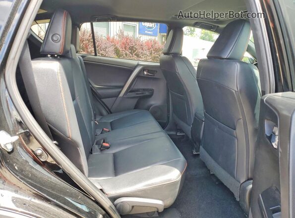 2T3JFREV1GW452489 2016 TOYOTA RAV4 Black Rear interior view