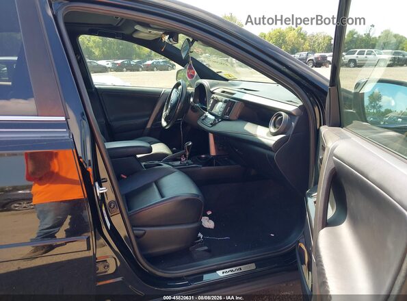 2T3JFREV1HW596934 2017 TOYOTA RAV4 Black Front interior view