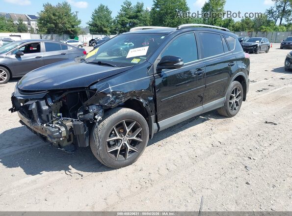 2T3JFREV1HW596934 2017 TOYOTA RAV4 Black Front left