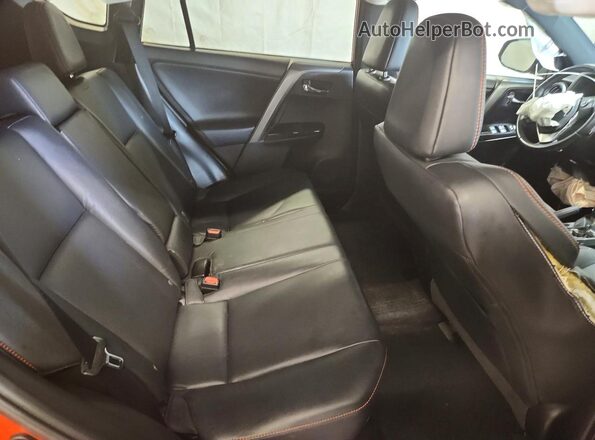 2T3JFREV2GW528642 2016 TOYOTA RAV4 Orange Vista interior trasera