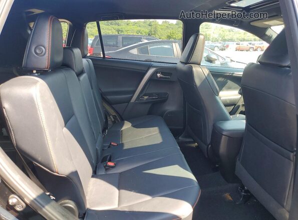 2T3JFREV4GW450185 2016 TOYOTA RAV4 Black Vista interior trasera