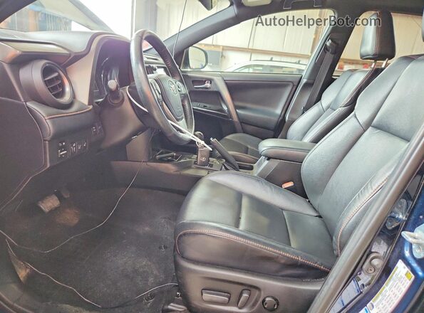2T3JFREV6JW839420 2018 TOYOTA RAV4 Blue Front interior view