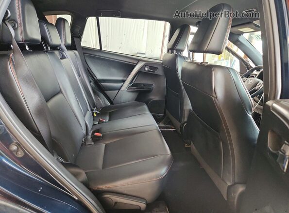 2T3JFREV6JW839420 2018 TOYOTA RAV4 Blue Rear interior view
