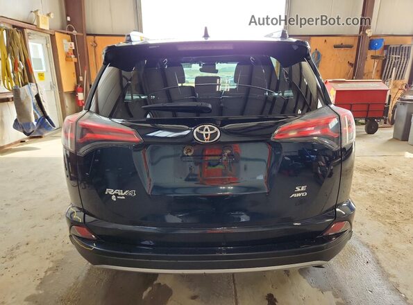 2T3JFREV6JW839420 2018 TOYOTA RAV4 Blue Rear view