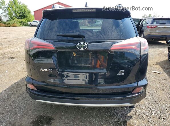 2T3JFREV7GW409436 2016 TOYOTA RAV4 Черный Вид сзади