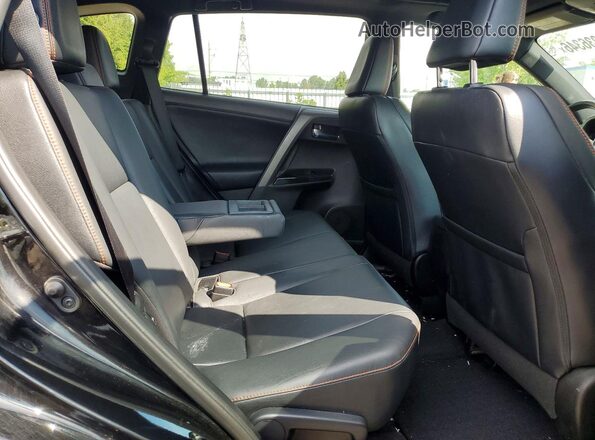 2T3JFREV7GW409436 2016 TOYOTA RAV4 Черный Вид задней части салона