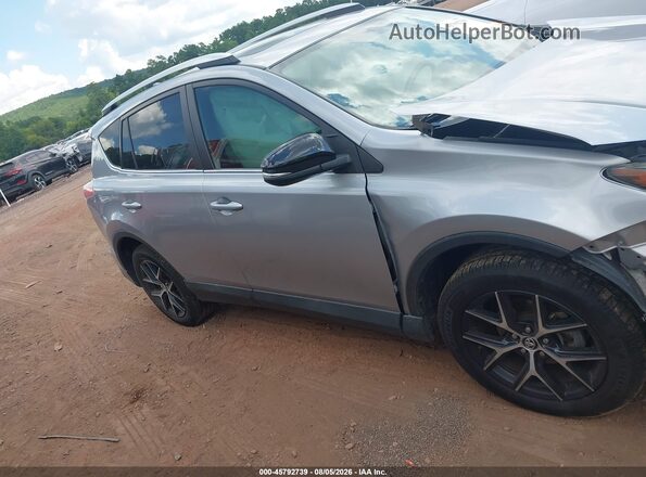 2T3JFREV7GW476652 2016 TOYOTA RAV4 Silver Սալոնի հետևի տեսք