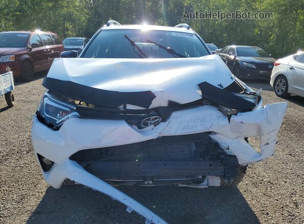 2T3JFREV8GW434796 2016 TOYOTA RAV4 White Front view