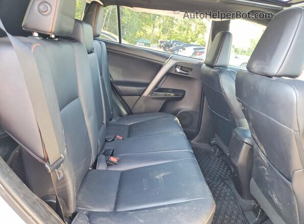 2T3JFREV8GW434796 2016 TOYOTA RAV4 White Rear interior view